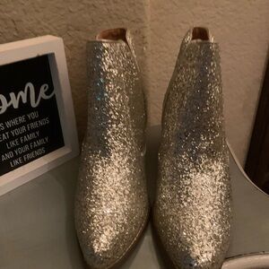 Not Rated gold glitter boots.